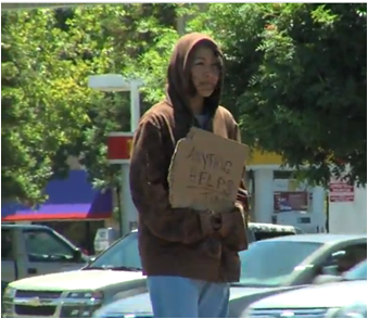 Sabrina Rodriguez '05 goes undercover to report on life as a panhandler for KTXL. (By: KTXL)